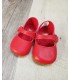 Zapatos de piel bebé rojo.
